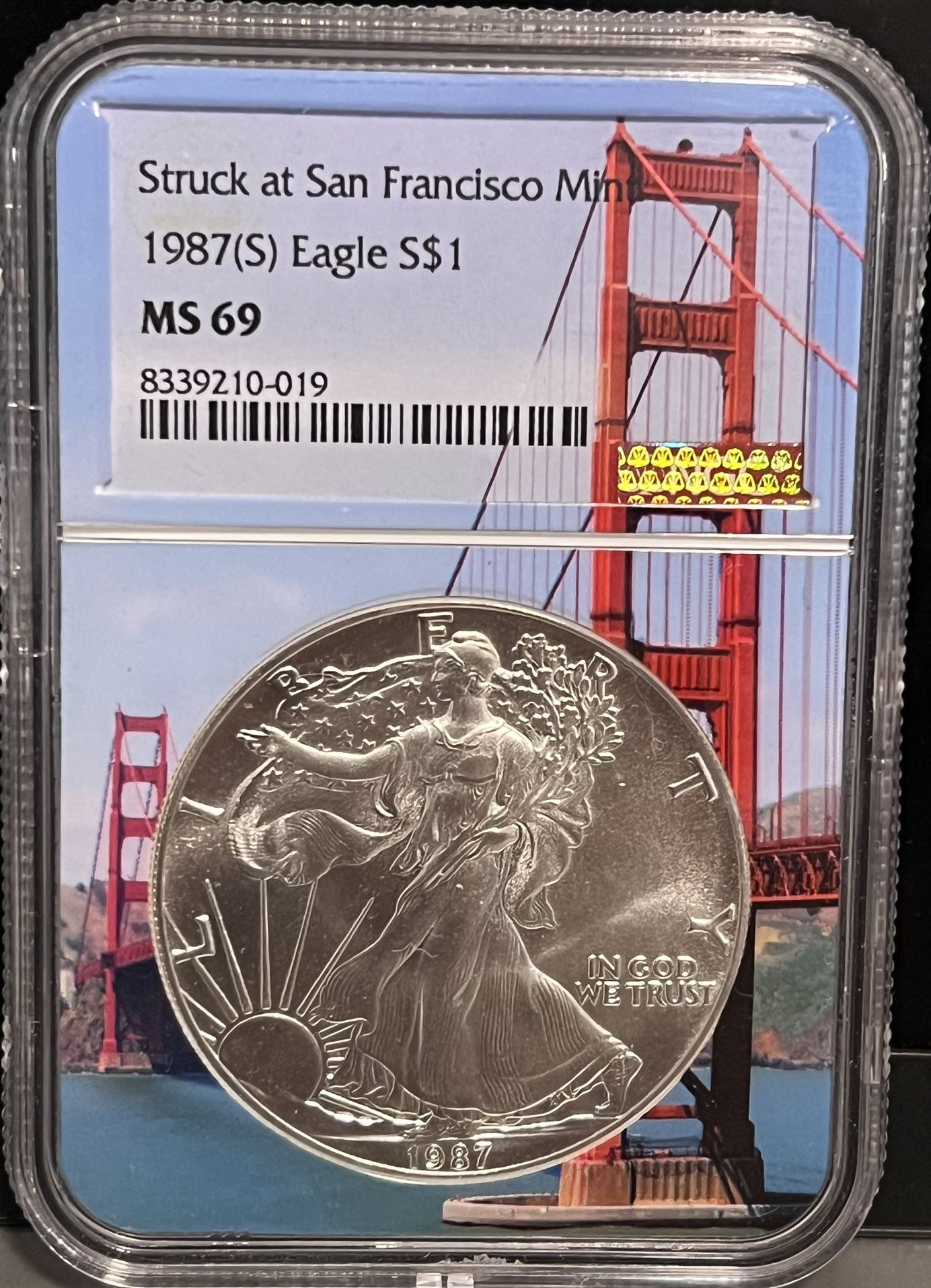 1987 S American Silver Eagle (ASE) • Struck at San Francisco Mint • Golden Gate Bridge Slab Core Label • 1 oz Fine Silver • Graded NGC MS69