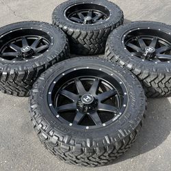 Hostile 6 Lug Off-Road 20” Wheels And 33” Nitto Mud-Terrain Tires Rims