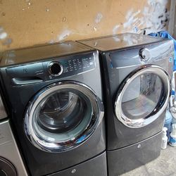 Electrolux Front Loading Washer And Stackable Gas Dryer Set With Pedestals 