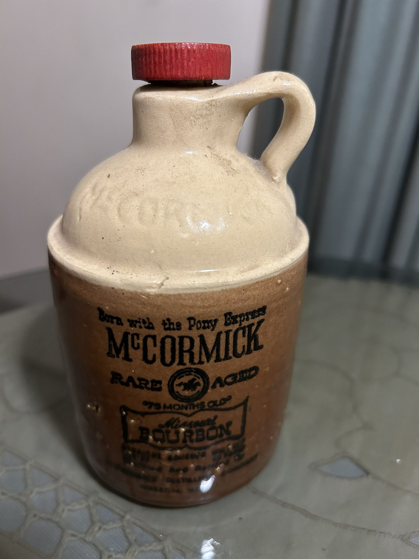 Small McCormick Aged Missouri Bourbon Glass Jar
