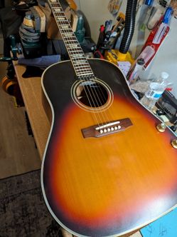 Repaired Orville by Gibson J160e acoustic guitar