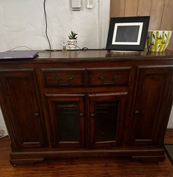 Under TV cabinet