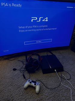 PS4 with accessories and games