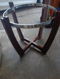 Glass top kitchen table with four faux leather chairs