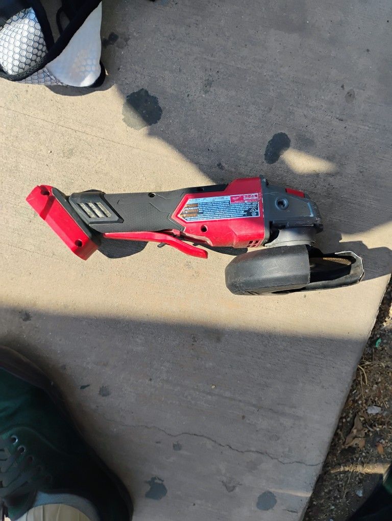 a Milwaukee M18 FUEL 4-1/2" / 5" Variable Speed Braking Grinder