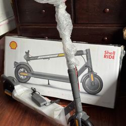 New In box Shell Electric Foldable Scooter 