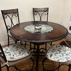 Round dining table and chairs