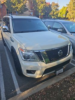 Armada 2017 white pearl  suv platinium