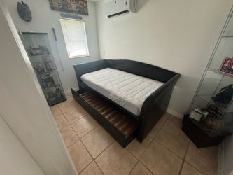 Black leather trundle bed