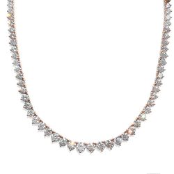 TENNIS NECKLACE IN ROSE GOLD Classic Tennis Necklace with 51 round brilliant diamonds weighing 14.32 carats total weight, F/G color, VS/SI clarity, se