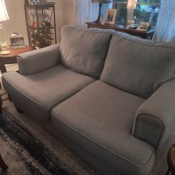 Teal Couch And Loveseat.  And 2 End tables And Coffee Table 