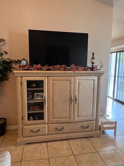 Wood Entertainment Center with Glass Door