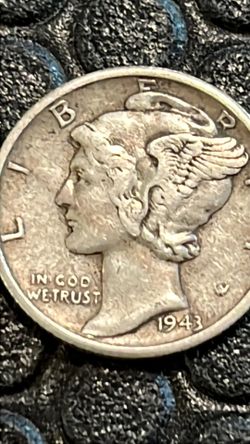 Silver dime in cod we trust