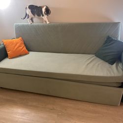 Green velvet sofa bed