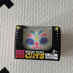 Authentic NeeDoh glow In The dark skull cat in Blue NIB