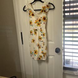 Little girl summer dress with some flowers