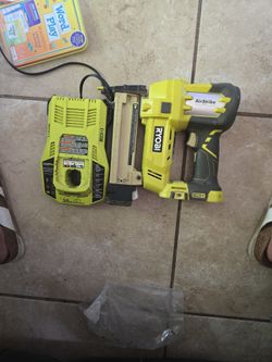 Battery Charger And Nail Gun