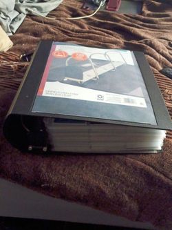 Binder of football cards
