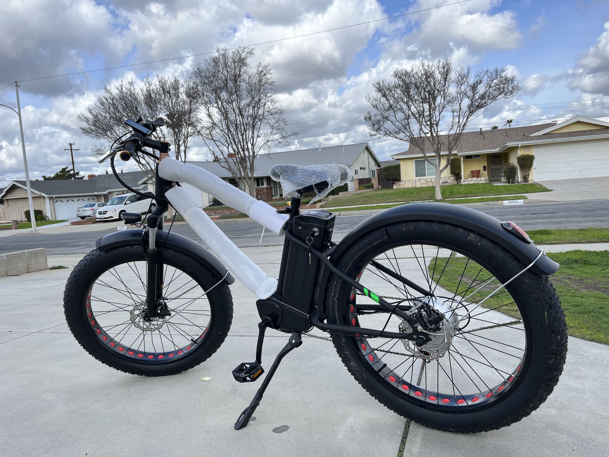 Electric bicycle, 800$, add a battery and a large seat cushion for 1000$