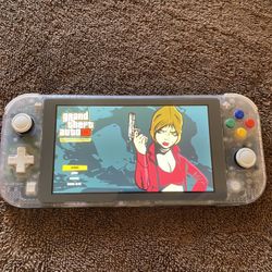 NINTENDO SWITCH LITE + 120 SWITCH GAMES INSTALLED