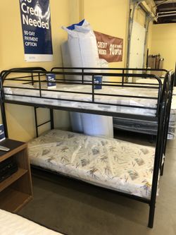 Bunk bed with mattresses