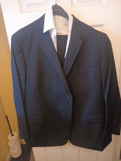Suit jacket and pants shirt optional