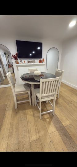 Ashly’s furniture round dining table
