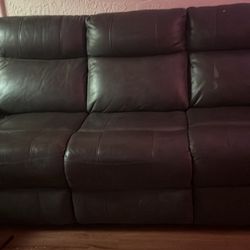 Leather reclining sofa set