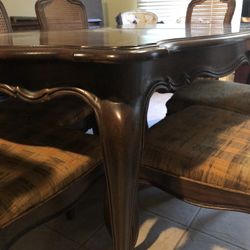 Vintage table, chairs in serving cabinet