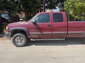 2001 Chevy 2500 HD , Extended cab  , repainted burgundy