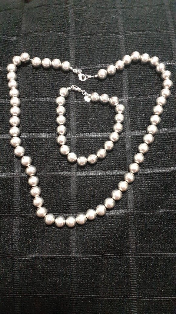 tiffany & co. silver bracelet and necklace set.