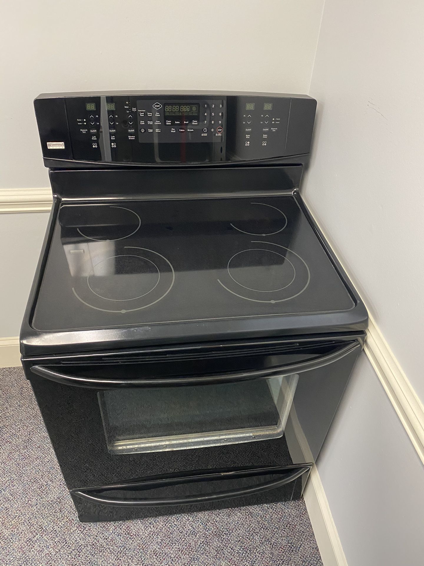 Kenmore elite glass top stove with convection oven and warmer draw