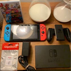Nintendo switch console with Blue/Red joycons Dock, SD card & Bowser's Fury