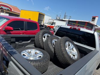 Set of 4 Tires with Silver Alloy Wheels