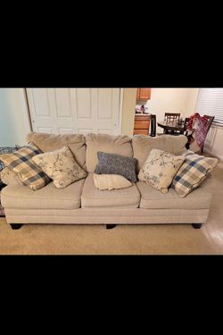 Tan one piece sofa couch