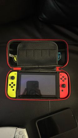 Nintendo switch with extra controllers and case