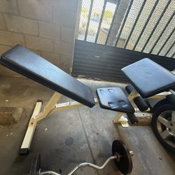 Weight bench with two bars and weight plates