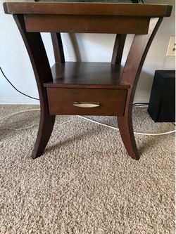 Wooden side table with drawer