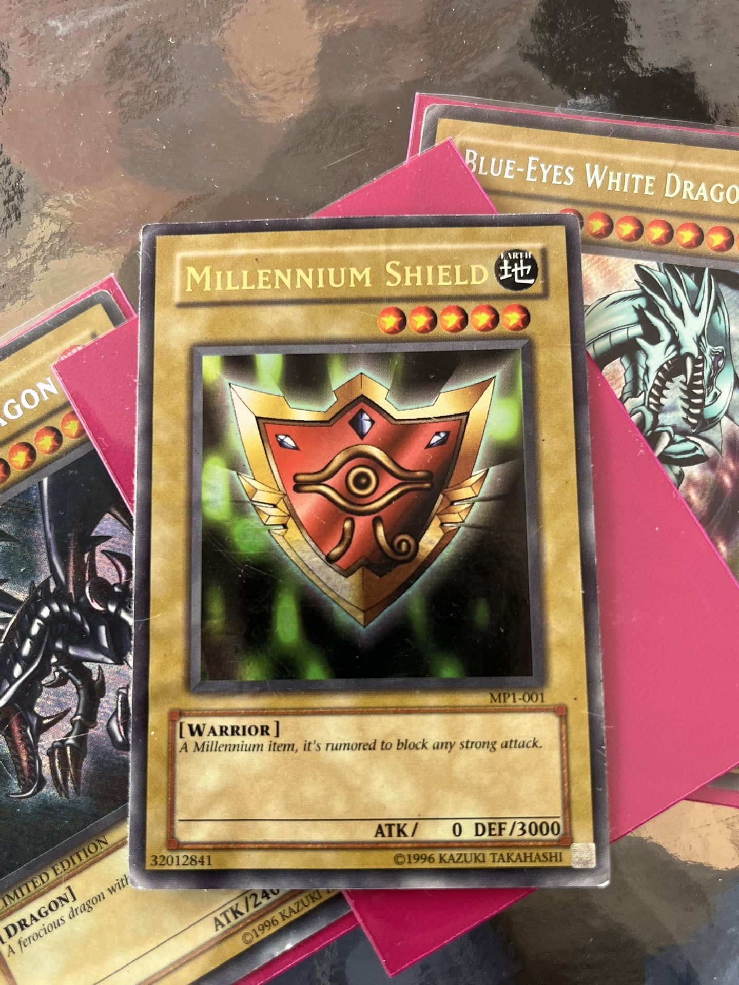 YuGiOh Millennium Shield - Ultra Rare - MP1-001 heavy play must see HOLO vintage