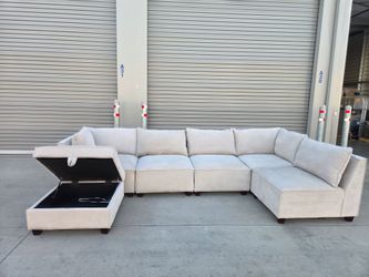 Marven 6-piece Fabric Modular Sectional with Storage Ottoman
-All Liquidation Items can include details such as scratches, tubmarks and others, for a
