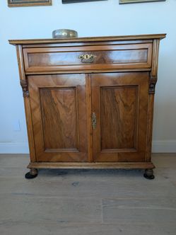 Walnut Burl Veneer Cabinet with drawer and shelves in closure.