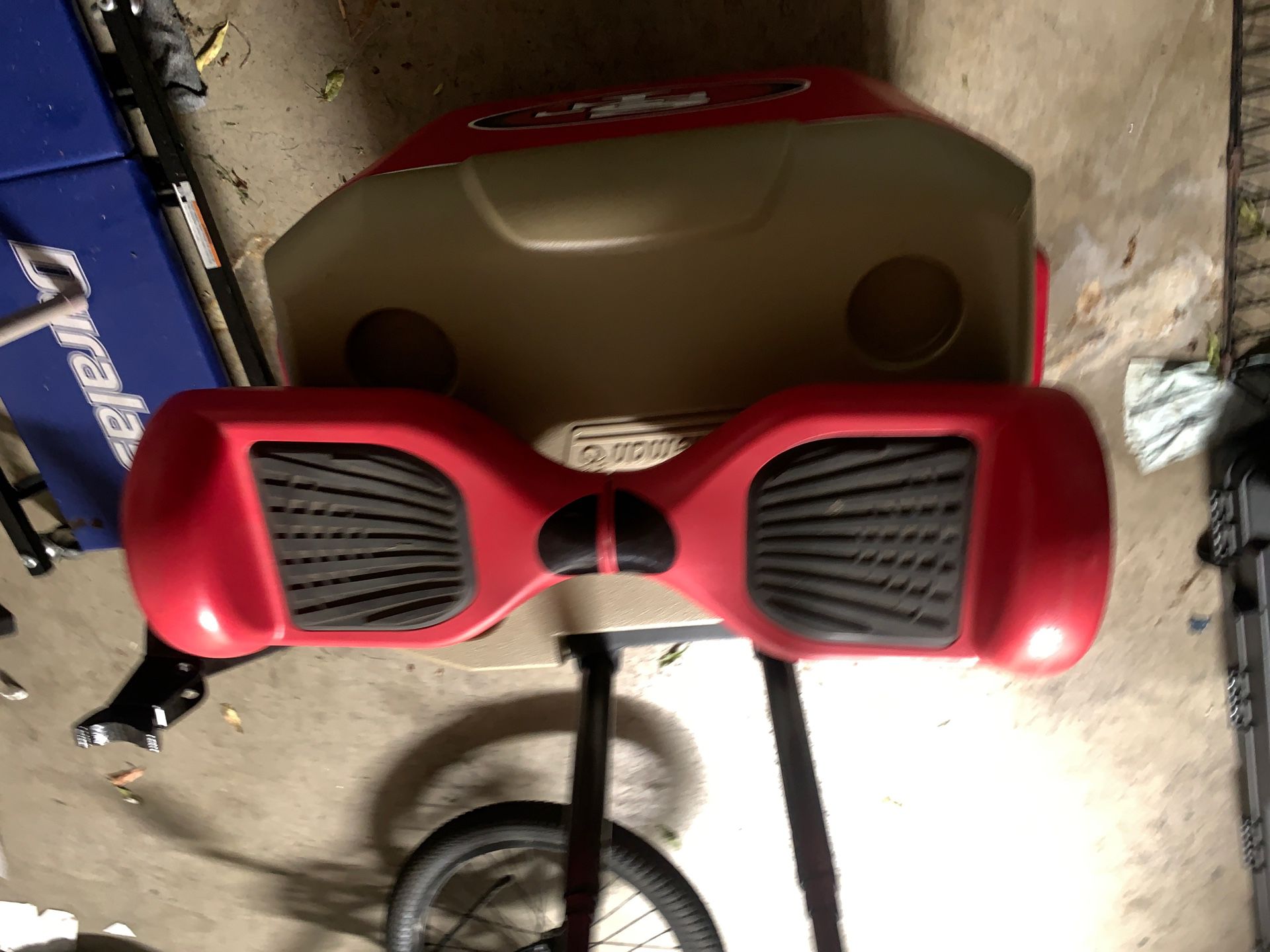 Red hoverboard with charger
