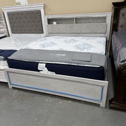 ALTYRA WHITE UPHOLSTERED BOOKCASE LED QUEEN PANEL BED