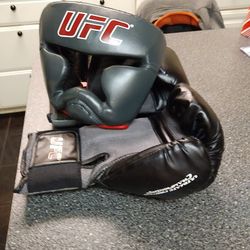 UFC. 16 OZ GLOVES. &. HEAD GEAR.  40 BUCKS  CLEAN SN GOOD CONDITION