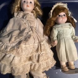 2 Porcelain Dolls  $35 Obo 