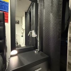 black nightstand with mirror