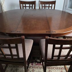 Dining  table with 6 chairs. Purchased at Quality Furniture. Table is in very good condition Hight 36"x 60"x42".  