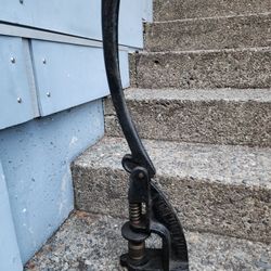 hand punch or hand press for installing eyelets/rivets.