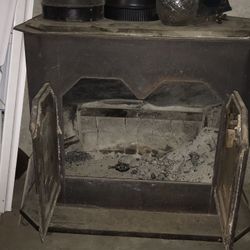 Garrison woodstove With a soap stone top