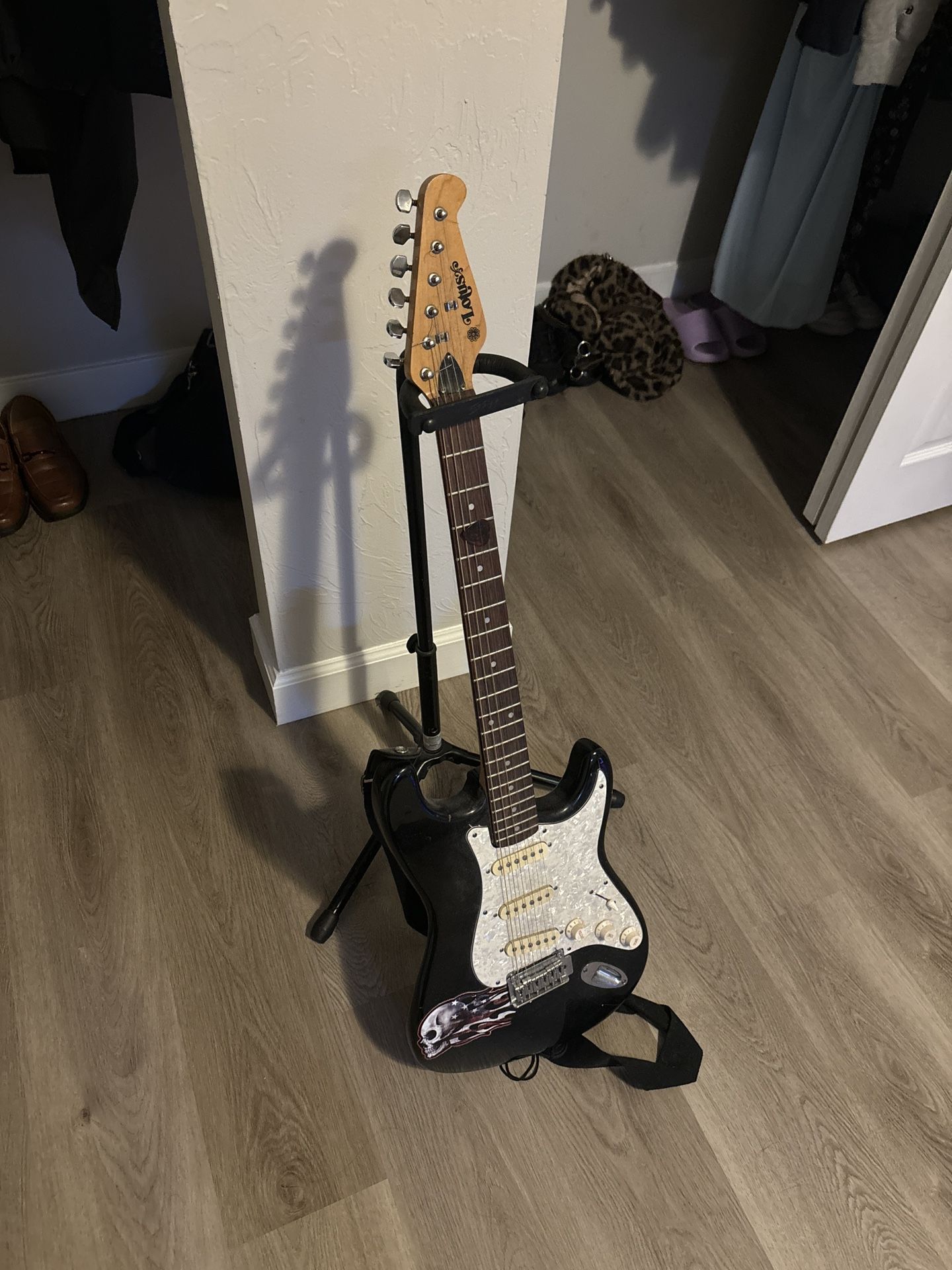 Electric guitar and stand